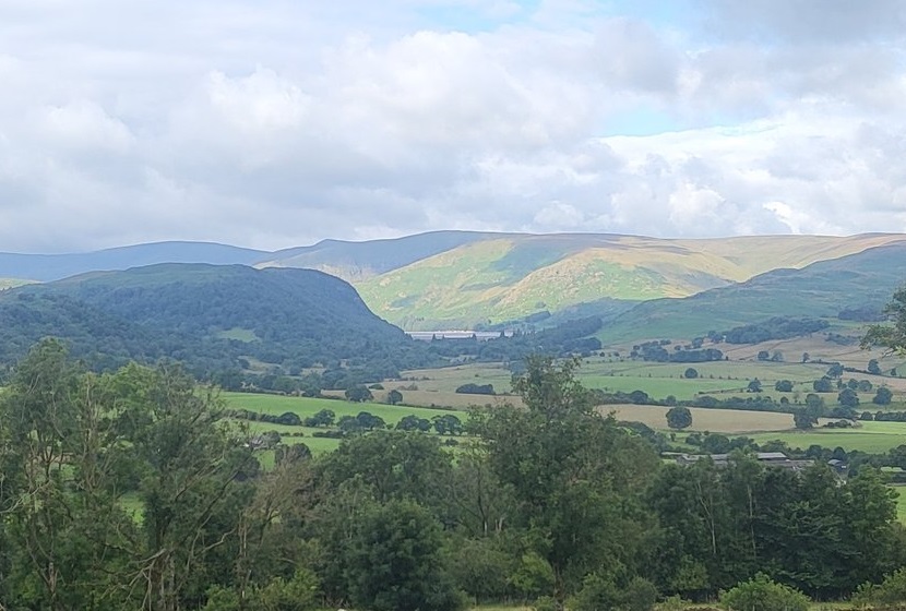 Haweswater in the far distance, with lakeland fells behind