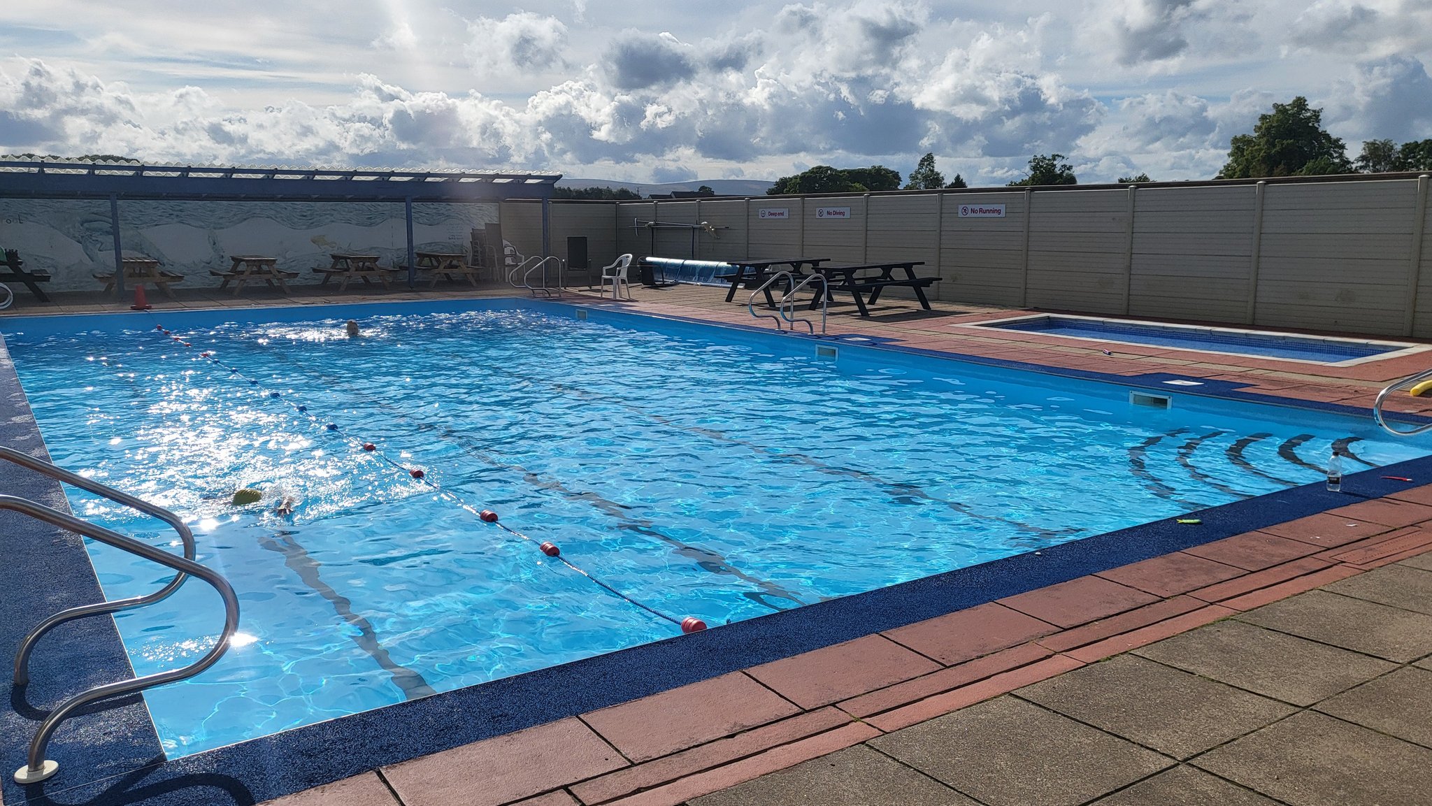 Outdoor pool in sunshine